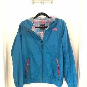 Woman’s North Face rain jacket